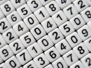 Colorful wooden numbers background. Numbers texture abstraction. Global economy crisis concept.