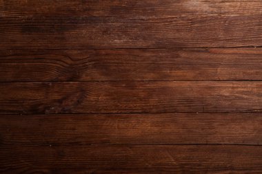 Düğümlü ve tırnak delikli klasik kahverengi ahşap arka plan dokusu. Eski boyalı ahşap duvar. Kahverengi soyut arka plan. Vintage ahşap, koyu renk yatay tahtalar.