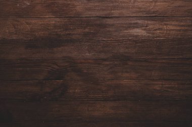 Düğümlü ve tırnak delikli klasik kahverengi ahşap arka plan dokusu. Eski boyalı ahşap duvar. Kahverengi soyut arka plan. Vintage ahşap, koyu renk yatay tahtalar.