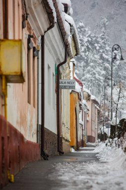 Rasnov, Romania  February 04 2023: It snowed beautifully in the medieval town of Rasnov in Romania.