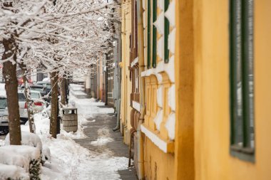 Rasnov, Romania  February 04 2023: It snowed beautifully in the medieval town of Rasnov in Romania.