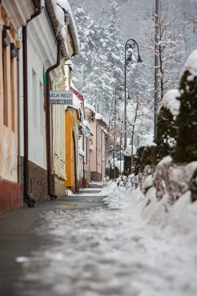 Rasnov, Romania  February 04 2023: It snowed beautifully in the medieval town of Rasnov in Romania.