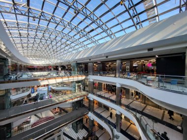 People Shop in interior Shopping Mall Malldova in Chisinau.