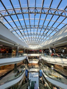 People Shop in interior Shopping Mall Malldova in Chisinau.