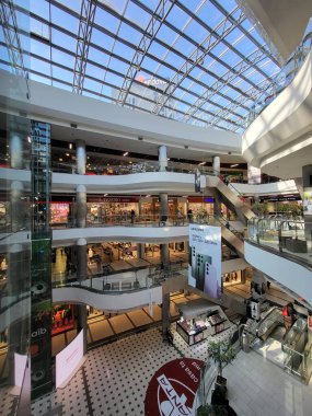 People Shop in interior Shopping Mall Malldova in Chisinau.