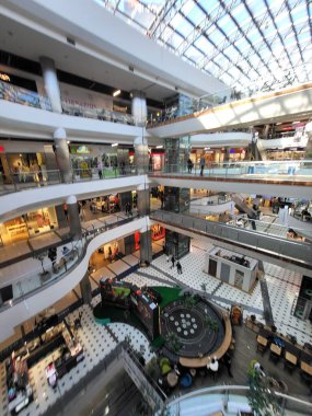 People Shop in interior Shopping Mall Malldova in Chisinau.