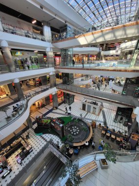 People Shop in interior Shopping Mall Malldova in Chisinau.