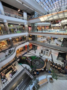 People Shop in interior Shopping Mall Malldova in Chisinau.