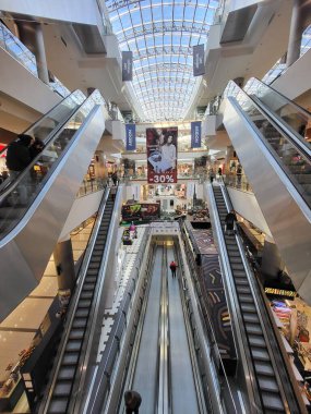 People Shop in interior Shopping Mall Malldova in Chisinau.