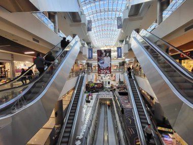 People Shop in interior Shopping Mall Malldova in Chisinau.