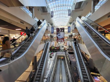 People Shop in interior Shopping Mall Malldova in Chisinau.
