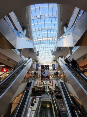 People Shop in interior Shopping Mall Malldova in Chisinau.