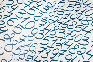 Colorful wooden numbers background. Numbers texture abstraction. Global economy crisis concept.