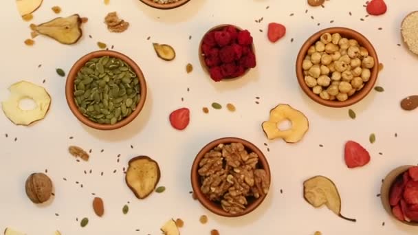 Healthy Vegetarian Food Concept Assortment Dried Fruits Nuts Seeds White — Stock Video