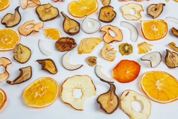 stock image Dried fruits isolated on white background. Healthy eating concept. Top view. Healthy vegetarian food concept. Dried fruit chips.