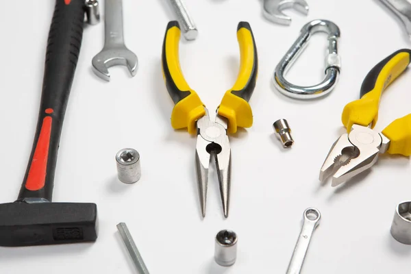 stock image Set of tools for repair in a case on a white background. Assorted work or construction tools. Wrenches, Pliers, screwdriver. Top view