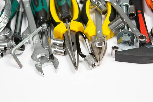 Stock image Set of tools for repair in a case on a white background. Assorted work or construction tools. Wrenches, Pliers, screwdriver. Top view