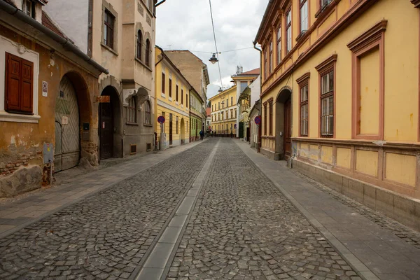 stock image Medieval street with historical buildings in the heart of Romania. Sibiu the eastern European citadel city. Travel in Europe