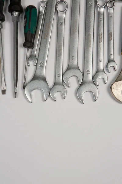 stock image Set of tools for repair in a case on a white background. Assorted work or construction tools. Wrenches, Pliers, screwdriver. Top view