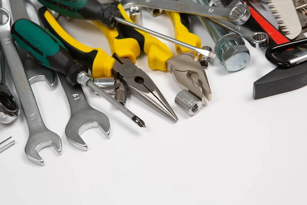 stock image Set of tools for repair in a case on a white background. Assorted work or construction tools. Wrenches, Pliers, screwdriver. Top view