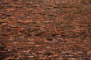 Tasarım için eski ve boş bir tuğla arka plan fotoğrafı. Kırmızı tuğla bir duvar..
