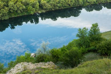 Photo with beautiful landscape and wonderful nature from the north of the Republic of Moldova, Europe. The Dniester River, the most important in Moldova. clipart