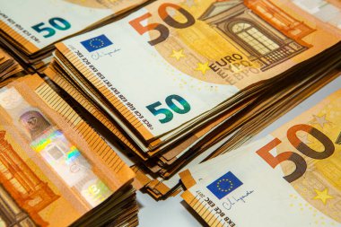 Euro nakit para. Avrupa Birliği para biriminin bir sürü banknotu yakında. Finansal yatırım, tasarruf, gelir kazancı kavramı