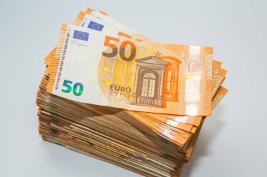 Euro nakit para. Avrupa Birliği para biriminin bir sürü banknotu yakında. Finansal yatırım, tasarruf, gelir kazancı kavramı.