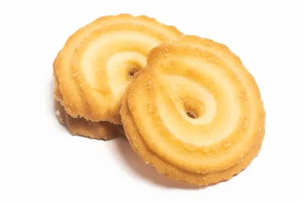 デンマークのバタークッキーの積み重ね 白い背景クリッピングパスで隔離されたバニラリングクッキー ロイヤリティフリーのストック画像