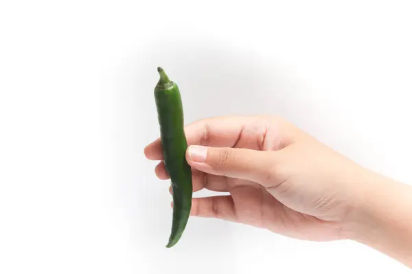 stock image Hand holding green hot chili pepper isolated on white background clipping path