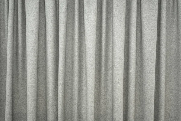 gray closed curtain use for background. picture for backdrop or add text message. background web design.