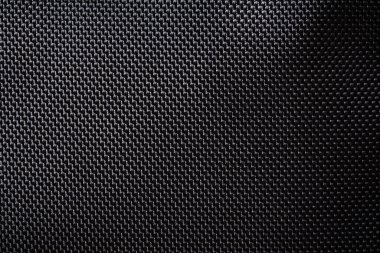Canvas Polyester texture synthetical for background. Black polyester fabric textile backdrop for interior art design or add text message.