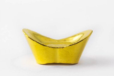 pure gold bar on white background. china gold design. Macro.