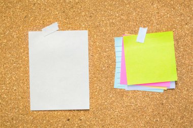 abstract paper note pin on cork board. cork board with blank notes. sticker note