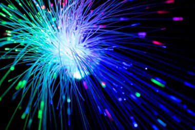 Abstract close up fiber optics light for background. picture used backdrop computer communication technology or advertising. Optical lighting.