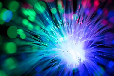 Abstract close up fiber optics light for background. picture used backdrop computer communication technology or advertising. Optical lighting.