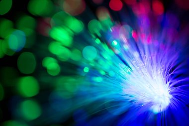 Abstract close up fiber optics light for background. picture used backdrop computer communication technology or advertising. Optical lighting.