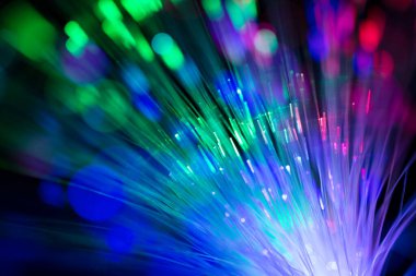 Abstract close up fiber optics light for background. picture used backdrop computer communication technology or advertising. Optical lighting.