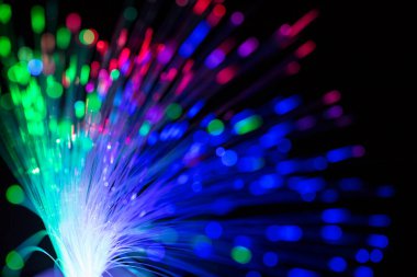 Abstract close up fiber optics light for background. picture used backdrop computer communication technology or advertising. Optical lighting.