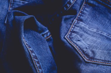 Arka plan web sitesi tasarımı veya arkaplan ürünü için mavi kot pantolon kumaşı kumaşı dokusunun Retro renk tonu.