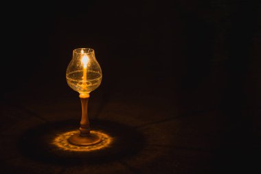 candle in glass lantern at the night. Buddha Makha Bucha Day with candle light for pray buddhists.