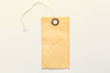Blank price sale tag tied with string. address label