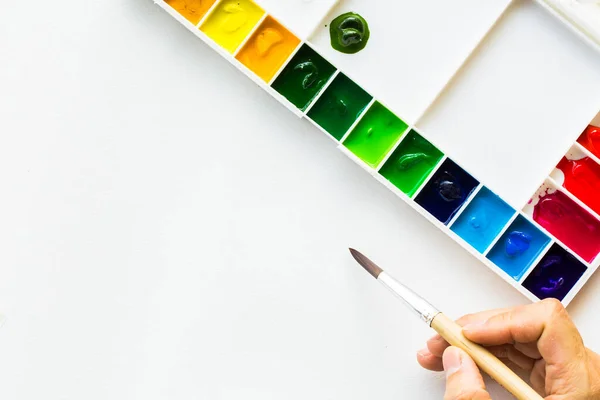 Top View Paintbrushes Palette Watercolor Paints White Paper Picture Copy — Zdjęcie stockowe