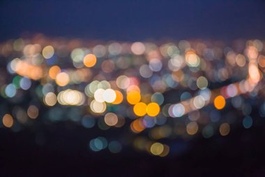 Abstract Blurred bokeh lights in the city. Background illustration with light colours for backdrop design or add text message.