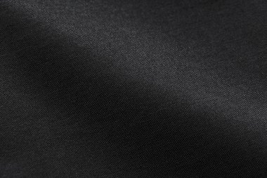 Canvas Polyester texture synthetical for background. Black polyester fabric textile backdrop for interior art design or add text message.