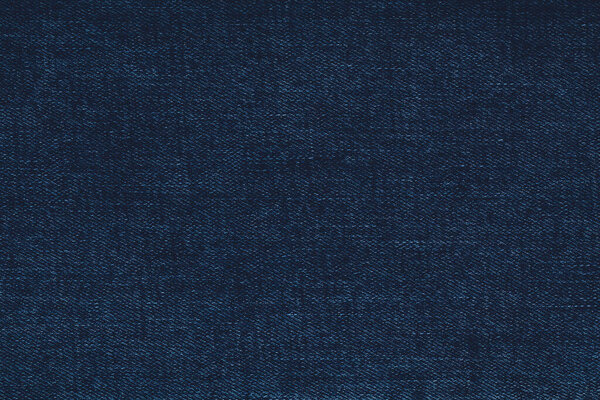 Ретро тон цвета темно-синие джинсы джинсовой текстуры текстуры для фона веб-сайт моды дизайн или фоновый продукт.
