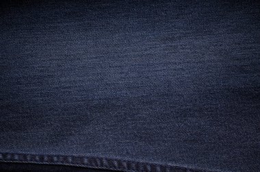 Arka plan web sitesi tasarımı ya da arkaplan ürünü için siyah kot pantolon kumaş dokusu Retro renk tonu.