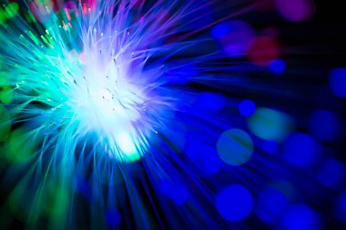 Abstract close up fiber optics light for background. picture used backdrop computer communication technology or advertising. Optical lighting.