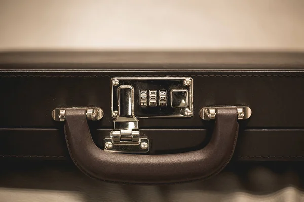 Safty Lock Business Briefcase. Storage and protection of cash and valuable goods. Business man with leather briefcase. Money and documents in bag.