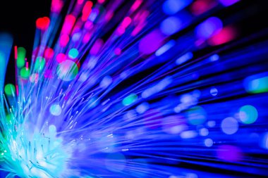 Abstract close up fiber optics light for background. picture used backdrop computer communication technology or advertising. Optical lighting.